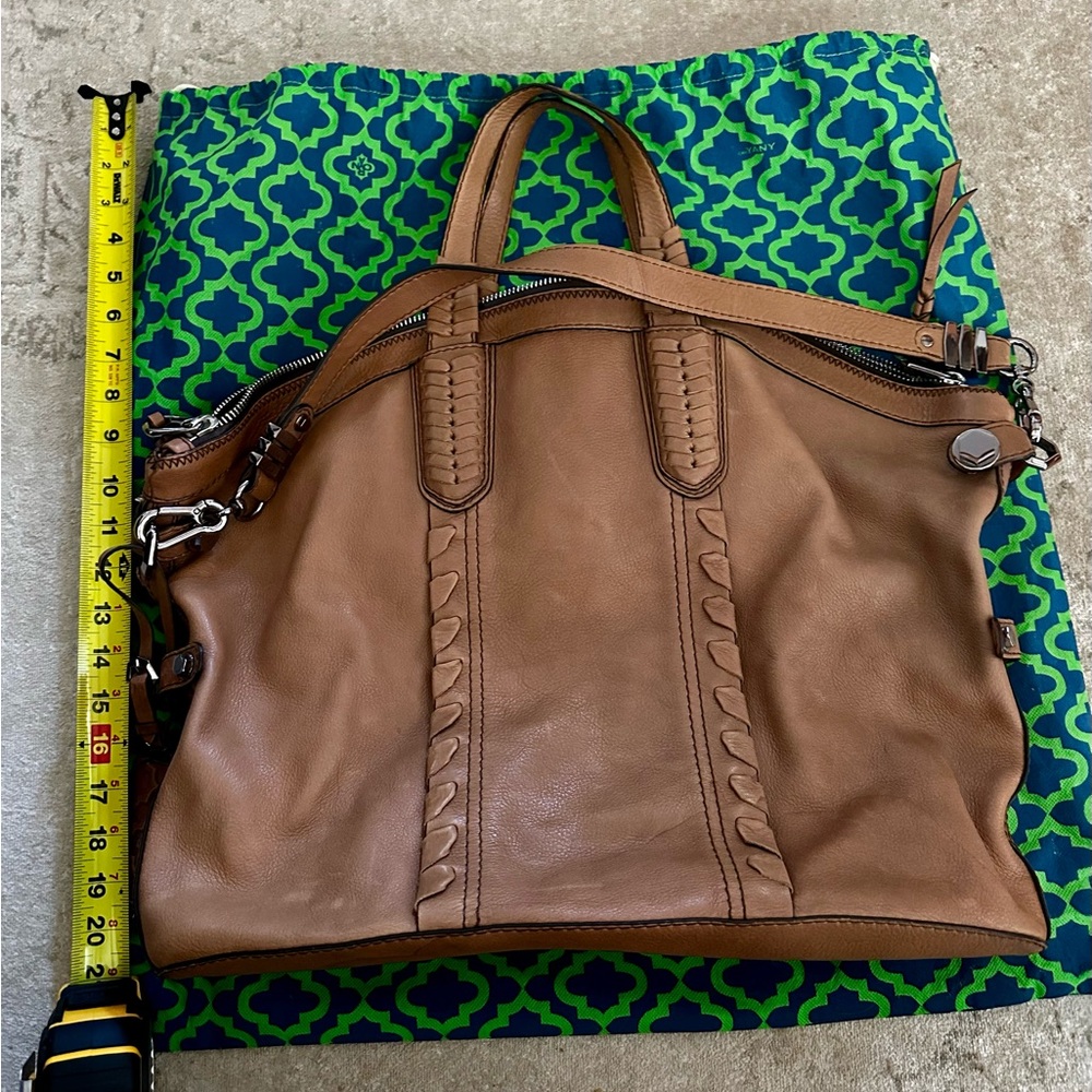 Oryany genuine leather handbag with dust bag. Water stains could be cleaned.